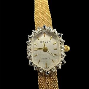 Elegant Gruen Gold Women's Quartz Watch with diamond and Topaz border